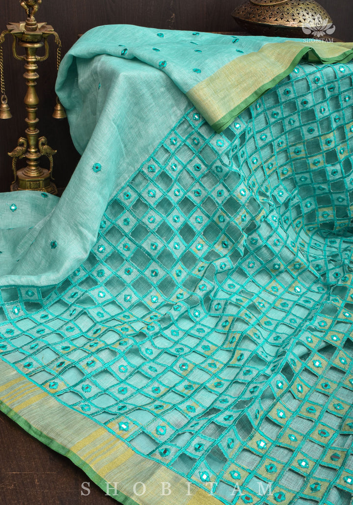 Jaali Pallu - Cutwork and Mirrorwork Saree in Linen by Linen in Teal Color | SHOBITAM