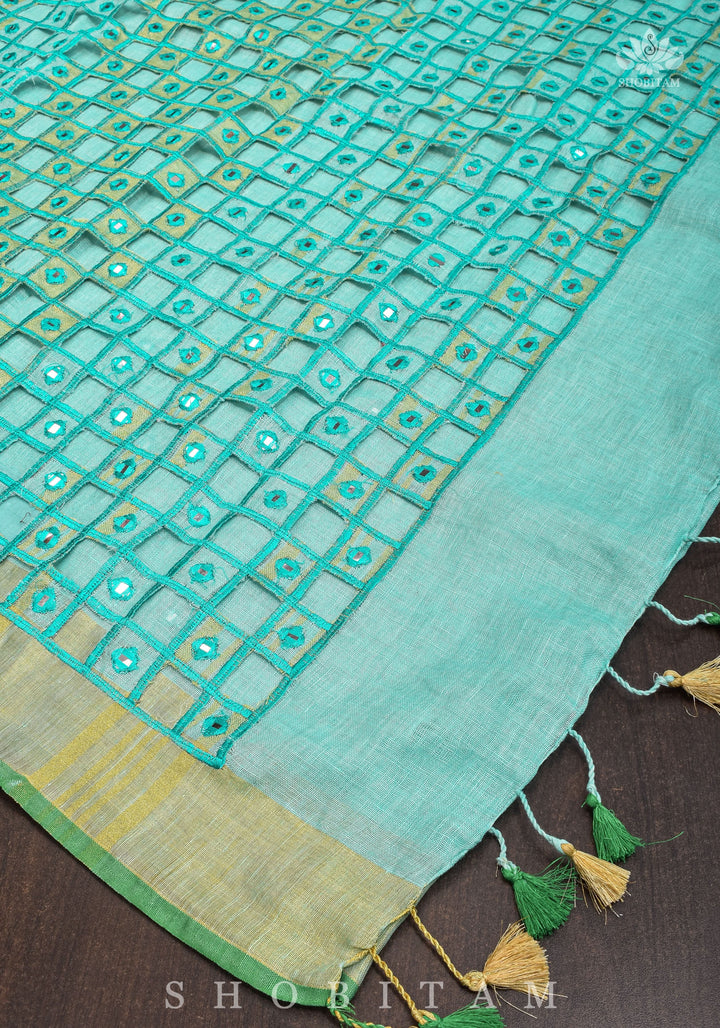 Jaali Pallu - Cutwork and Mirrorwork Saree in Linen by Linen in Teal Color | SHOBITAM