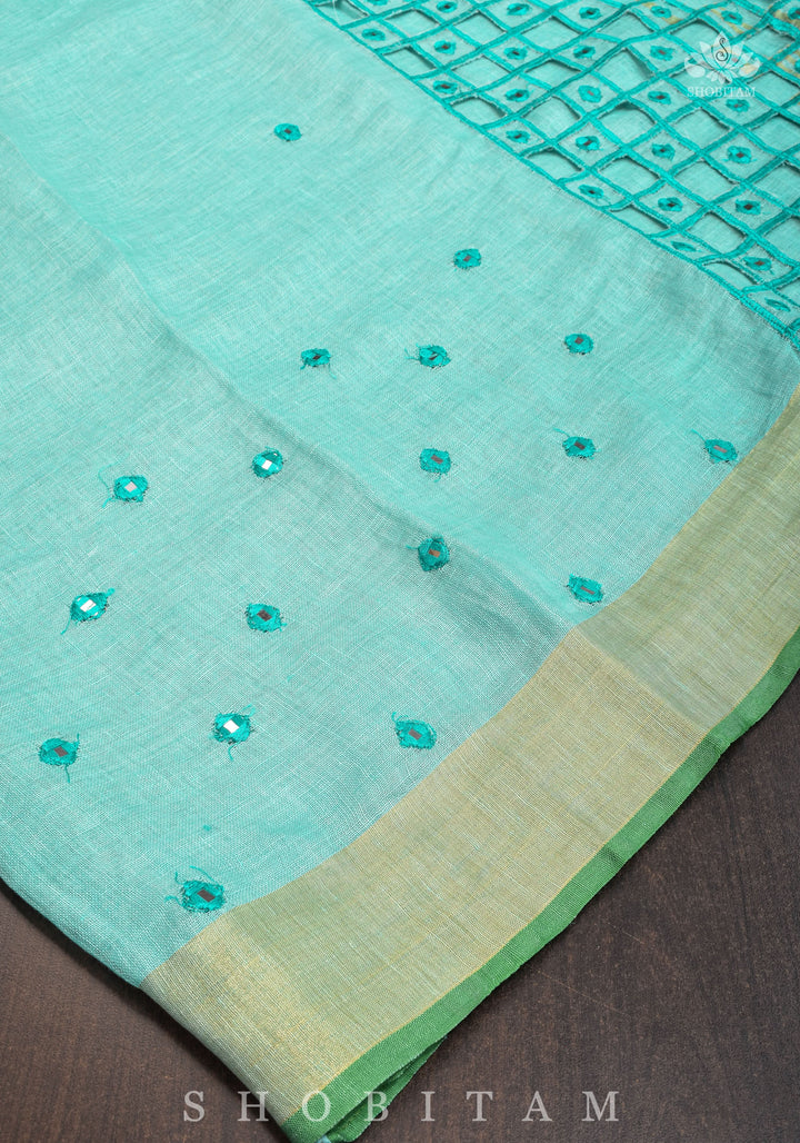 Jaali Pallu - Cutwork and Mirrorwork Saree in Linen by Linen in Teal Color | SHOBITAM