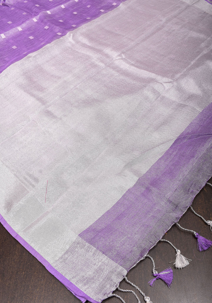 Lavender Hued Tissue Linen Saree with silver zari borders and long tassels!