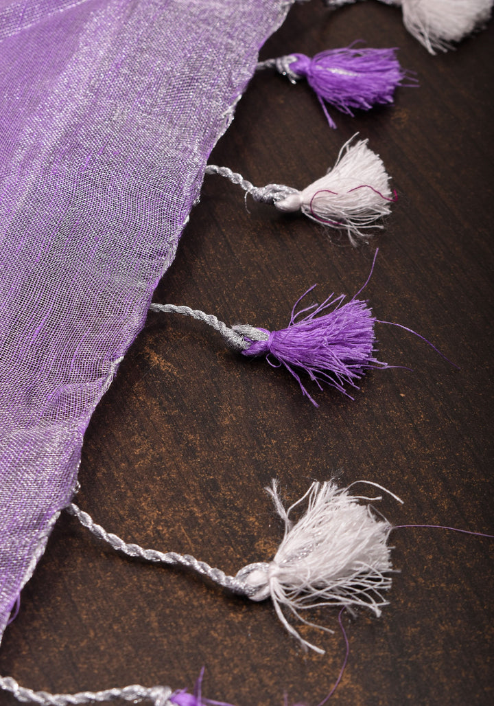 Lavender Hued Tissue Linen Saree with silver zari borders and long tassels!