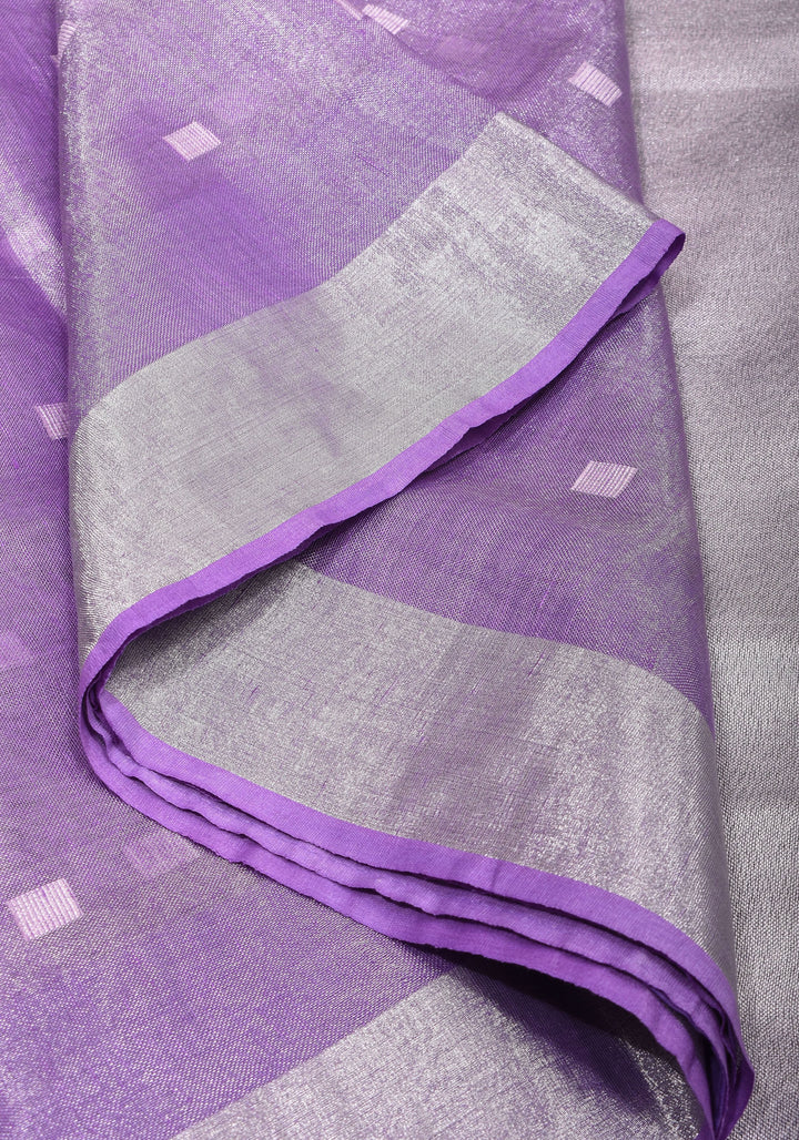 Lavender Hued Tissue Linen Saree with silver zari borders and long tassels!