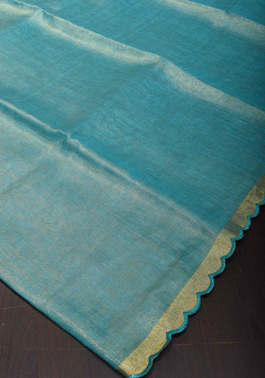 Sea Green Scalloped Tissue Linen Saree and Golden border