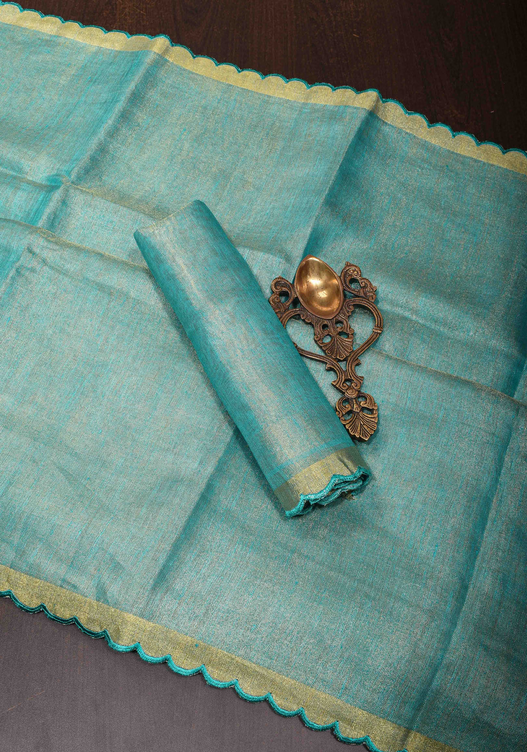 Sea Green Scalloped Tissue Linen Saree and Golden border