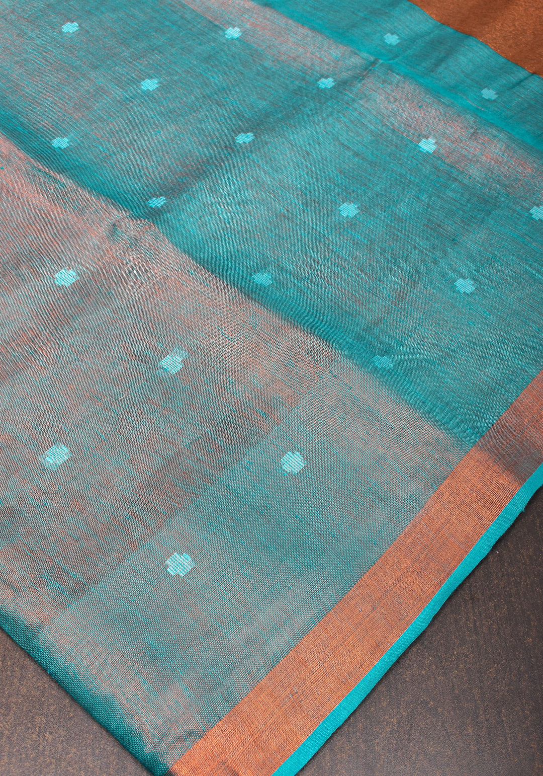 Teal Copper Tissue Stunning Tissue Linen Saree with Chunri Butis and Full Tissue Pallu!