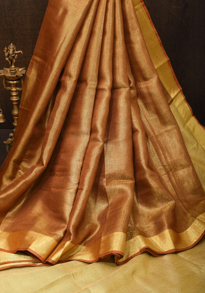 Caramel and Gold Tissue Linen Saree with Zari Border and long tassels | SHOBITAM