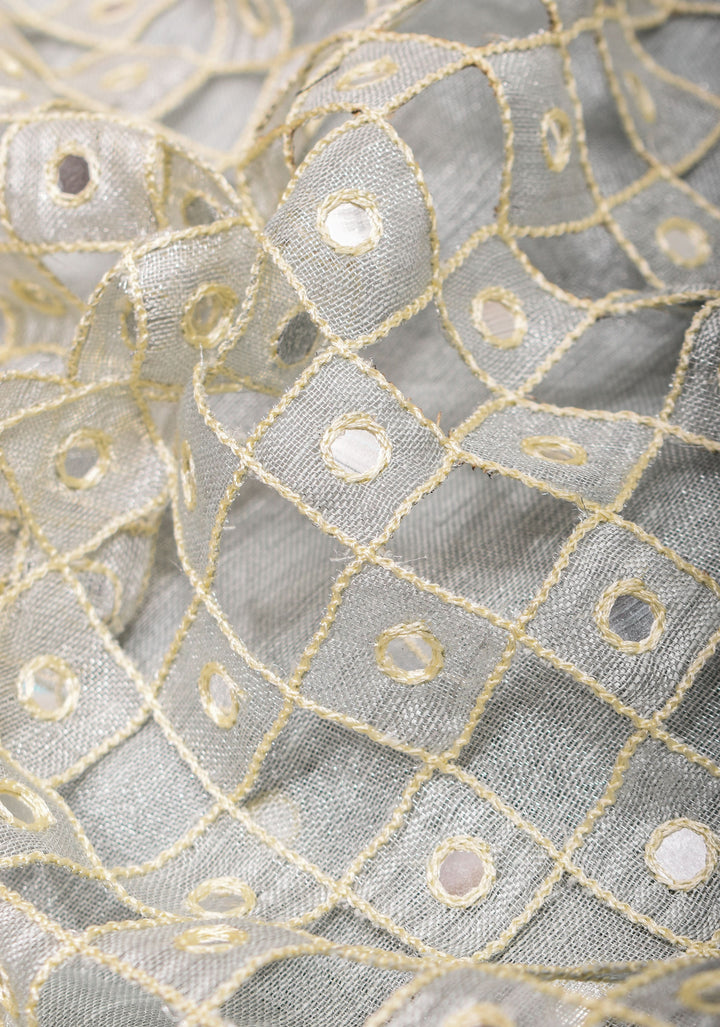 Cutwork and Mirror Work Tissue Linen Saree in White Silver with dramatic tassels