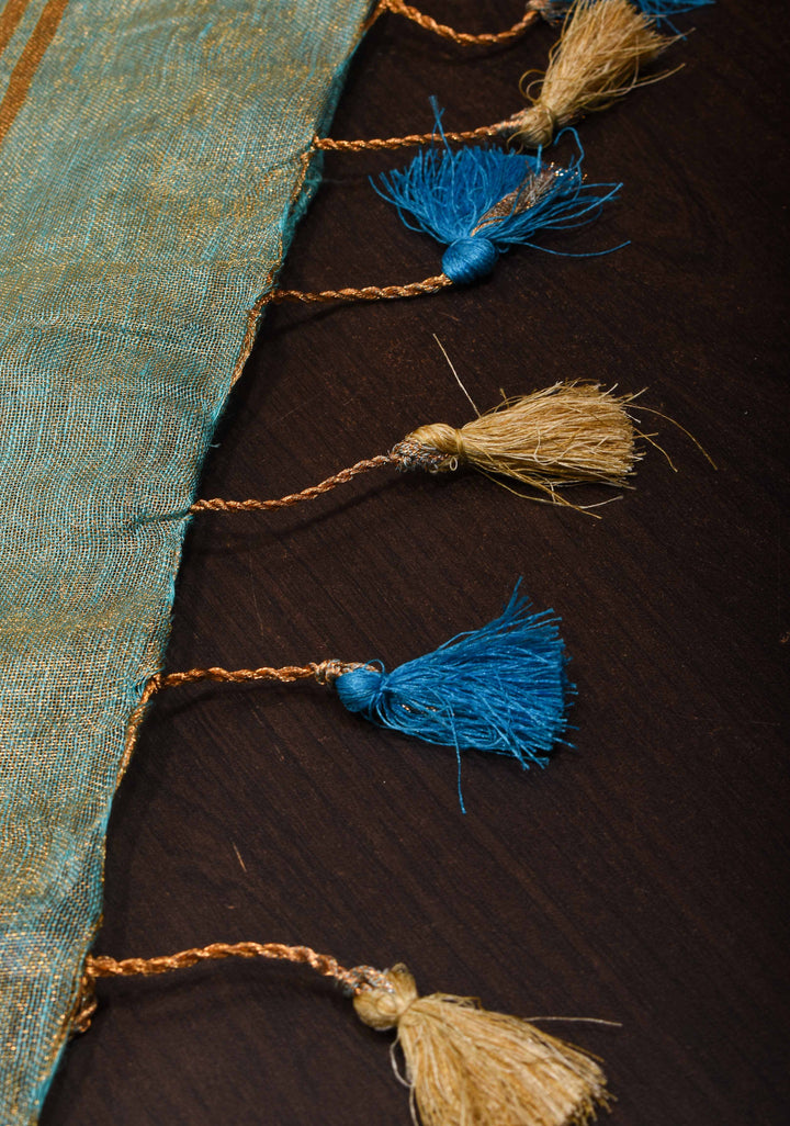 Pre order Hand Beadwork on Tissue Linen Saree in Blue with Gold Tissue
