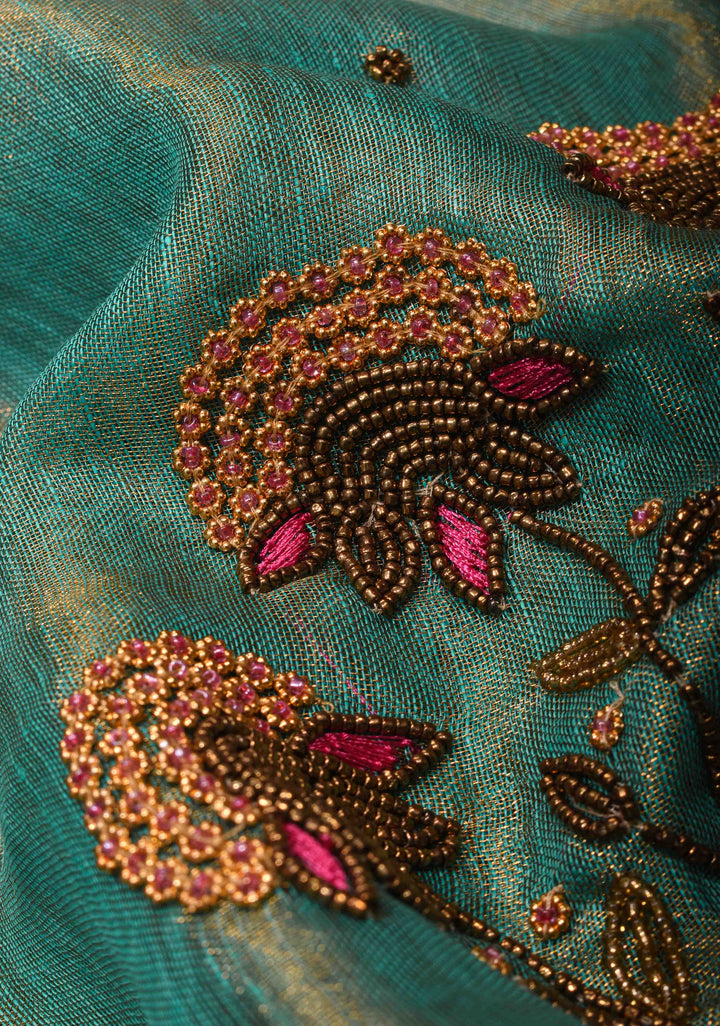 Pre order Hand Beadwork on Tissue Linen Saree in Blue with Gold Tissue
