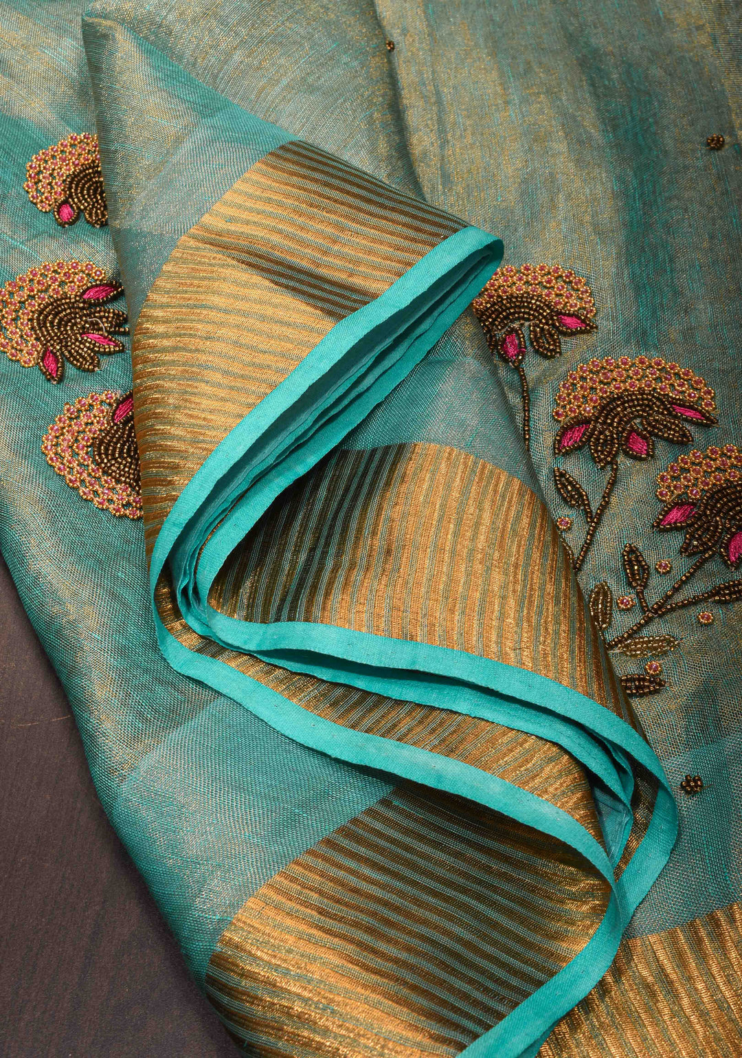 Pre order Hand Beadwork on Tissue Linen Saree in Blue with Gold Tissue