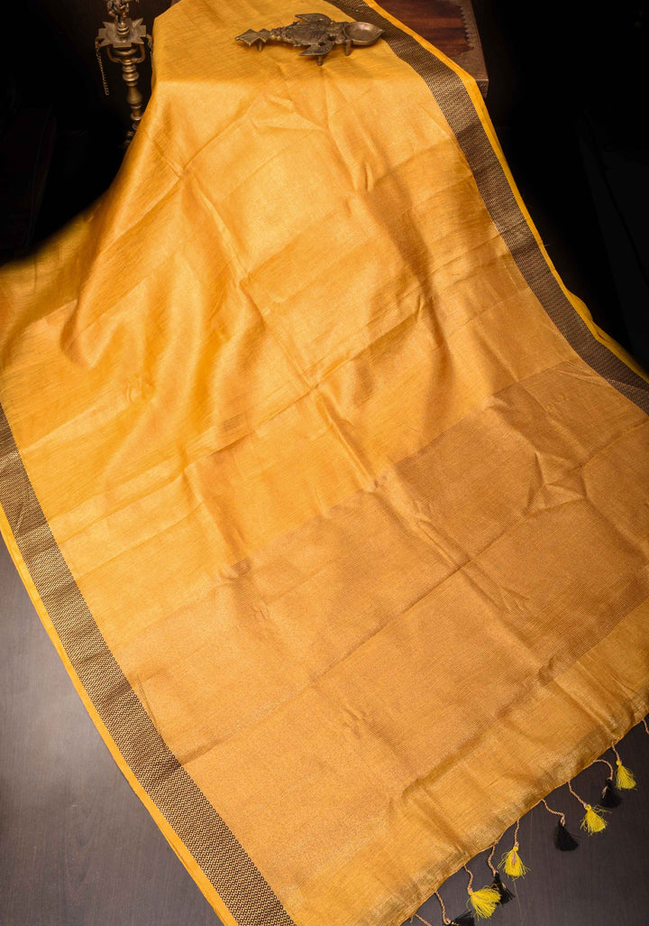 Mustard Yellow Tissue Linen Saree with Contrast zari Border