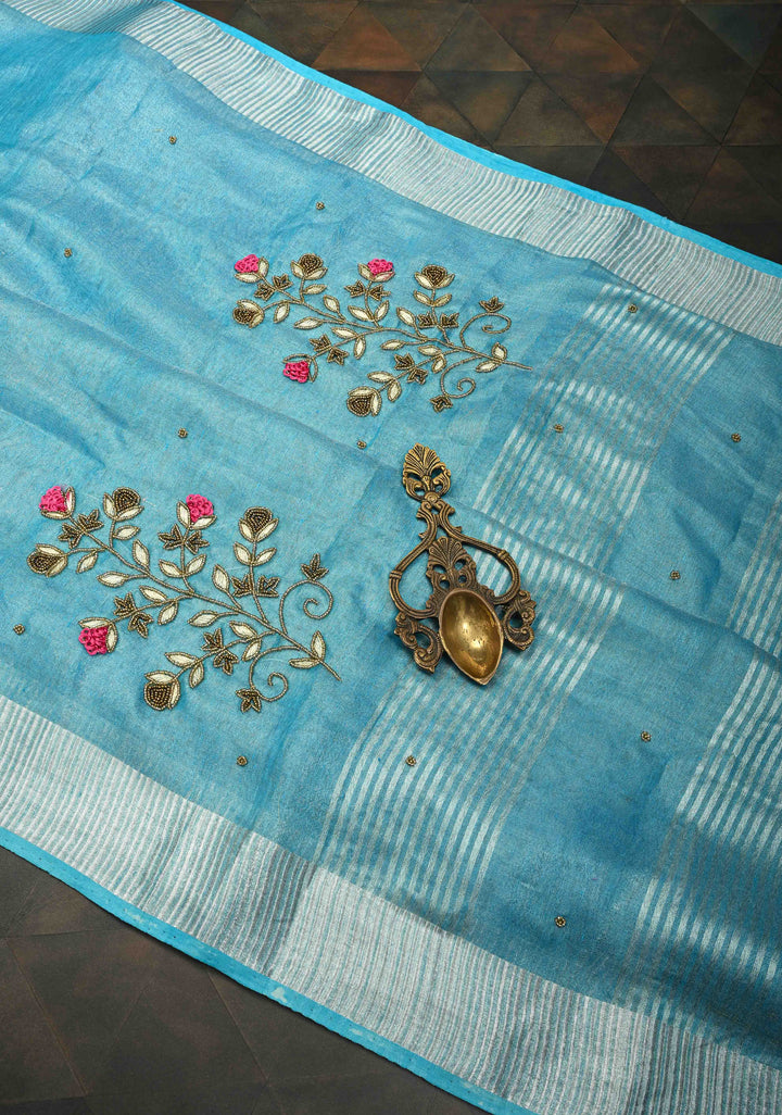 Hand Beadwork on Tissue Linen Saree in Sky Blue with Silver Tissue