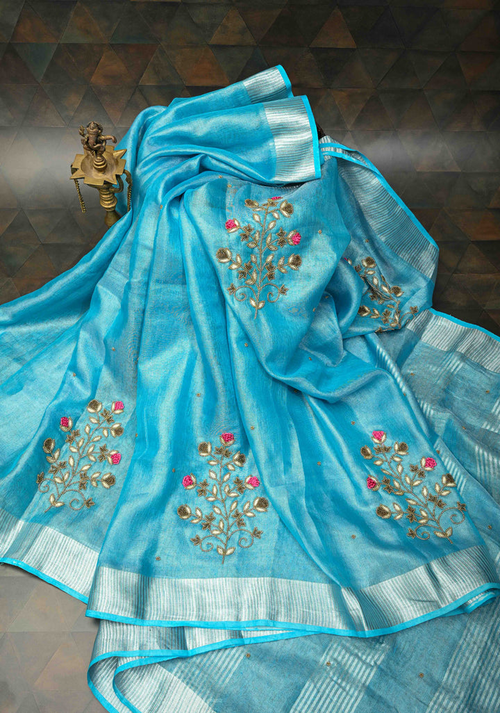 Hand Beadwork on Tissue Linen Saree in Sky Blue with Silver Tissue