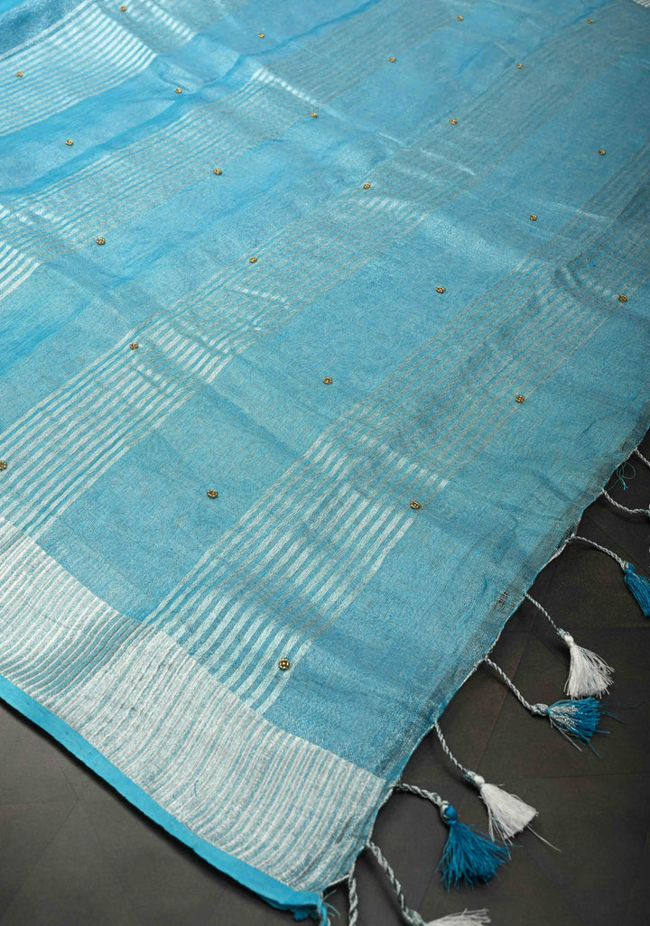 Hand Beadwork on Tissue Linen Saree in Sky Blue with Silver Tissue