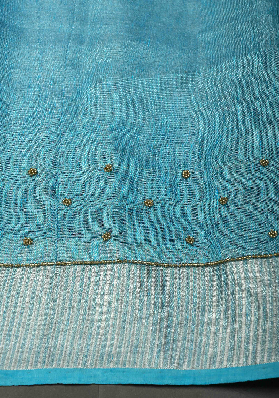 Hand Beadwork on Tissue Linen Saree in Sky Blue with Silver Tissue