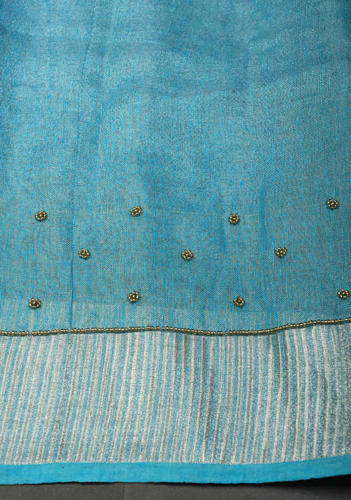 Hand Beadwork on Tissue Linen Saree in Sky Blue with Silver Tissue
