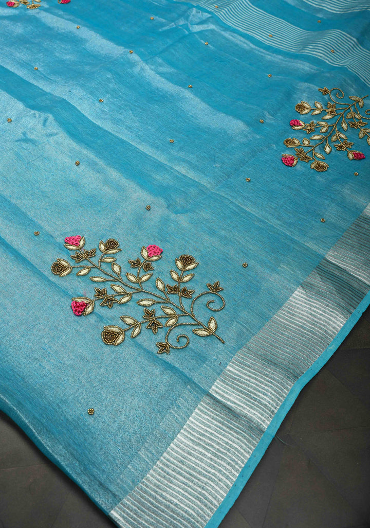 Hand Beadwork on Tissue Linen Saree in Sky Blue with Silver Tissue