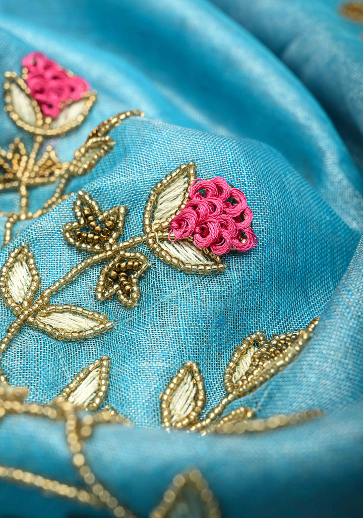 Hand Beadwork on Tissue Linen Saree in Sky Blue with Silver Tissue