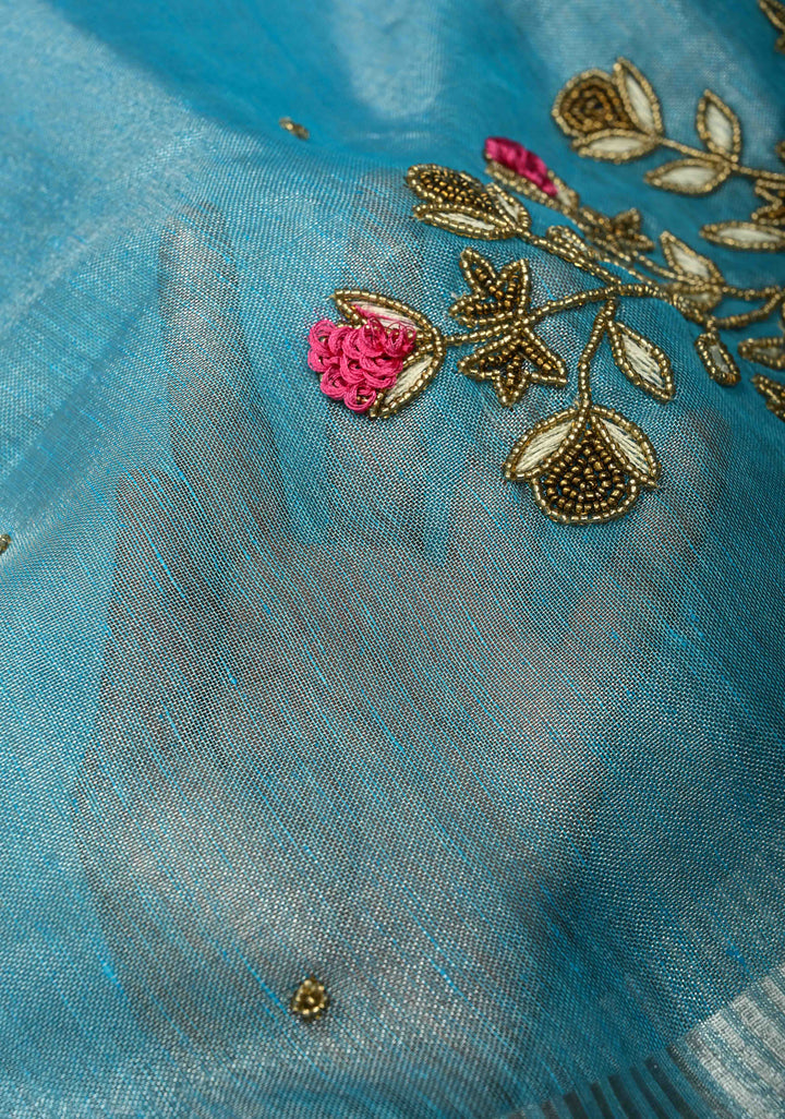 Hand Beadwork on Tissue Linen Saree in Sky Blue with Silver Tissue