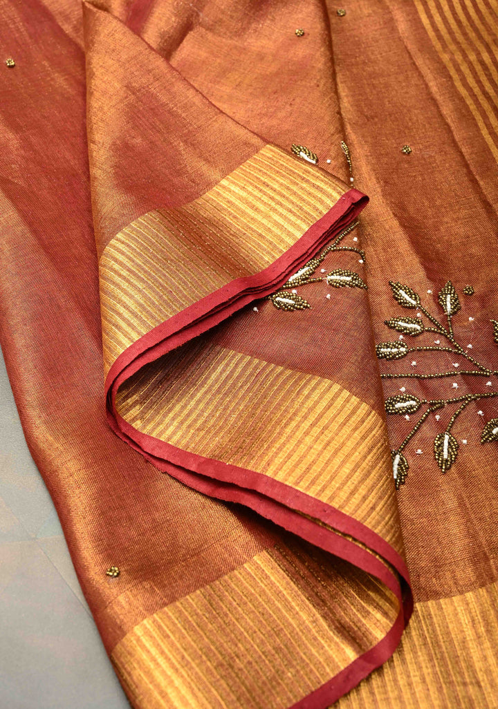 Golden Tissue Linen Saree in Reddish-Brown with Bead Embellishments