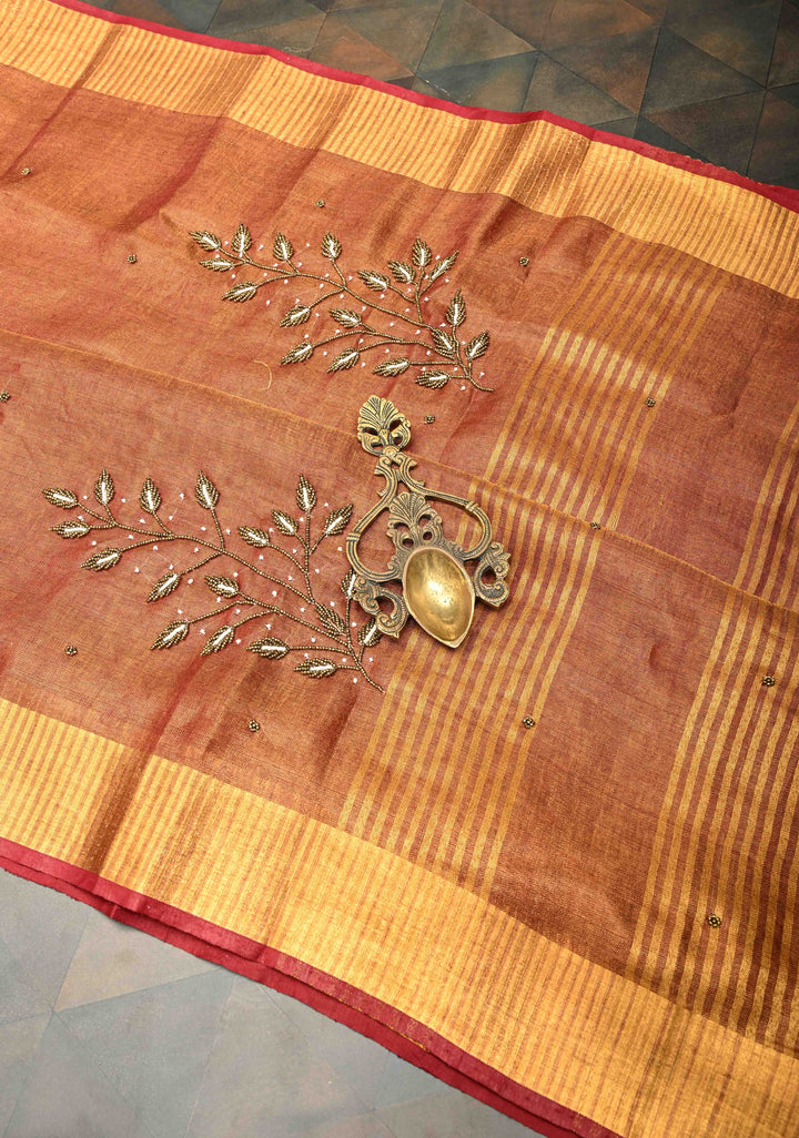 Golden Tissue Linen Saree in Reddish-Brown with Bead Embellishments