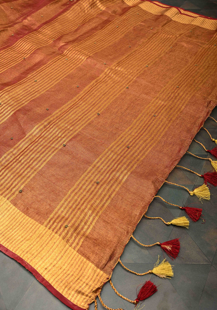 Golden Tissue Linen Saree in Reddish-Brown with Bead Embellishments