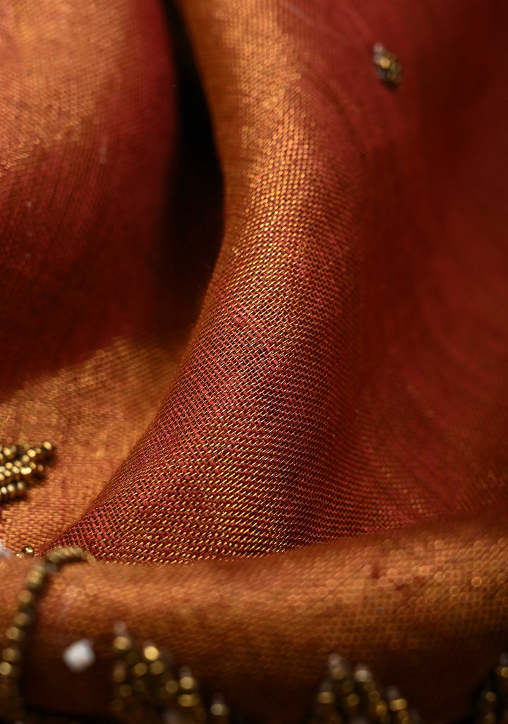 Golden Tissue Linen Saree in Reddish-Brown with Bead Embellishments