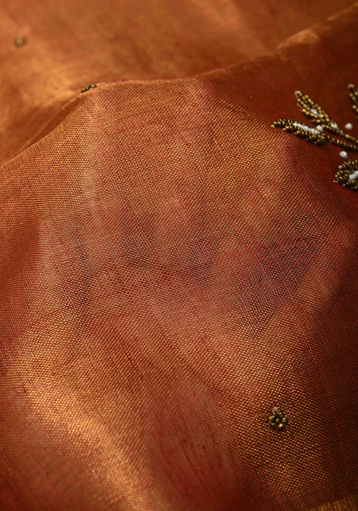 Golden Tissue Linen Saree in Reddish-Brown with Bead Embellishments
