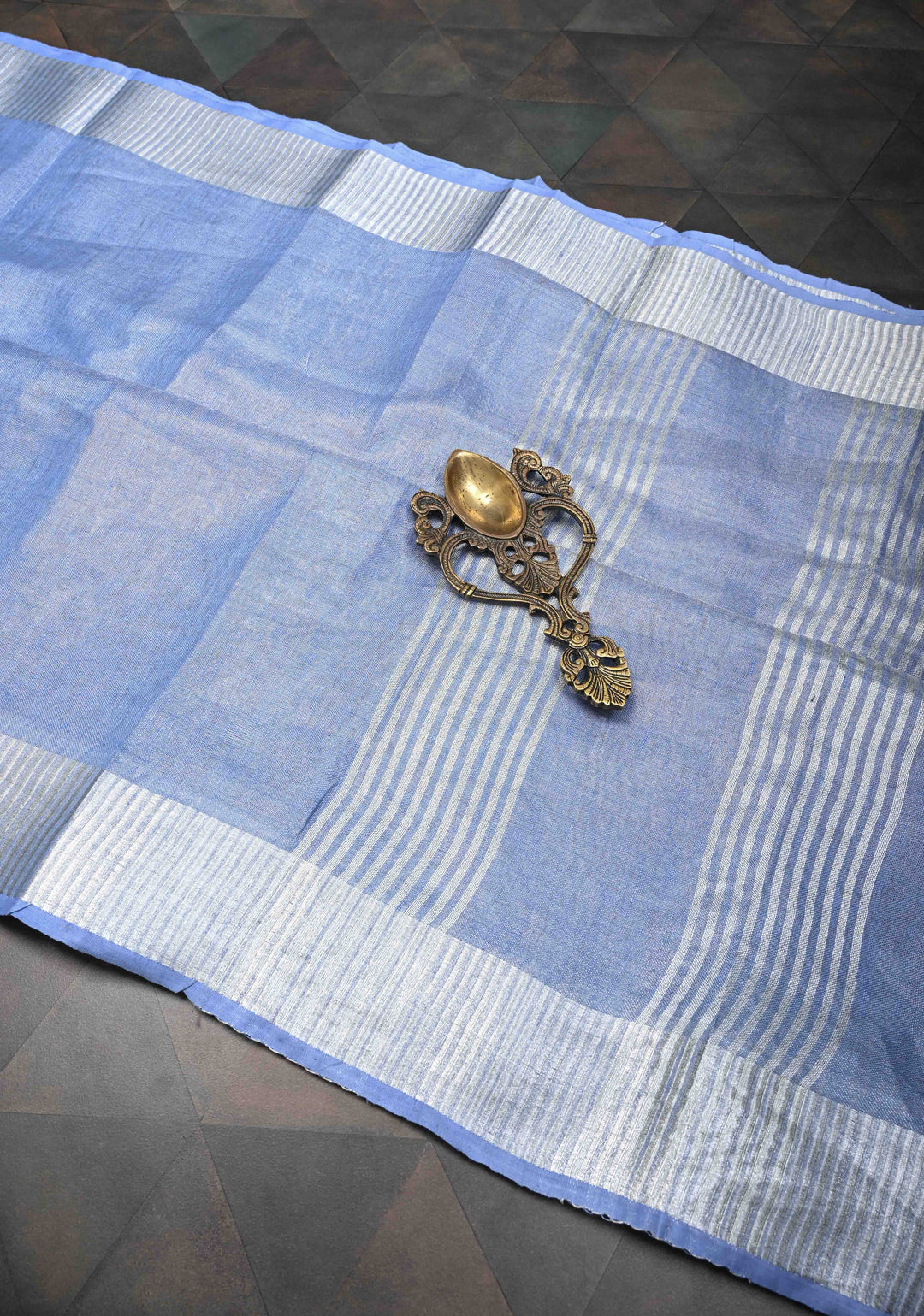 Light Blue Tissue Linen Saree With Silver Zari Border