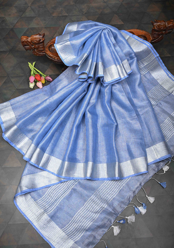 Light Blue Tissue Linen Saree With Silver Zari Border