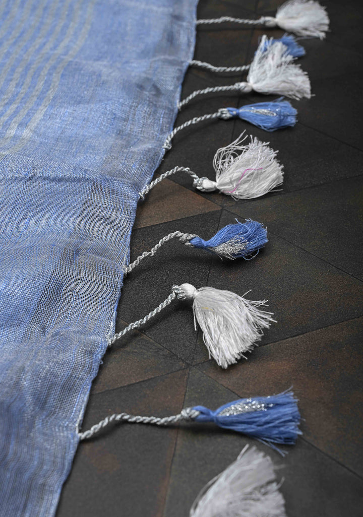 Light Blue Tissue Linen Saree With Silver Zari Border