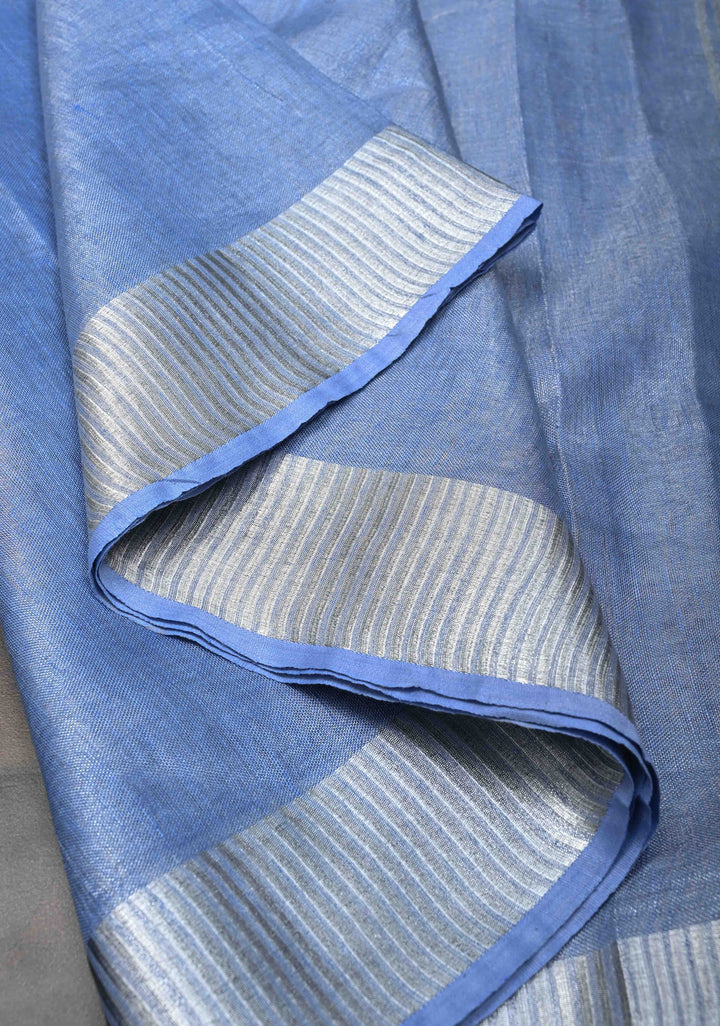 Light Blue Tissue Linen Saree With Silver Zari Border