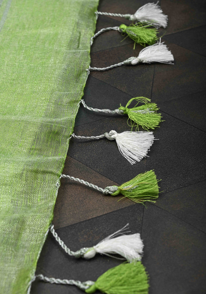 Light Green Tissue Linen Saree With Silver Zari Border