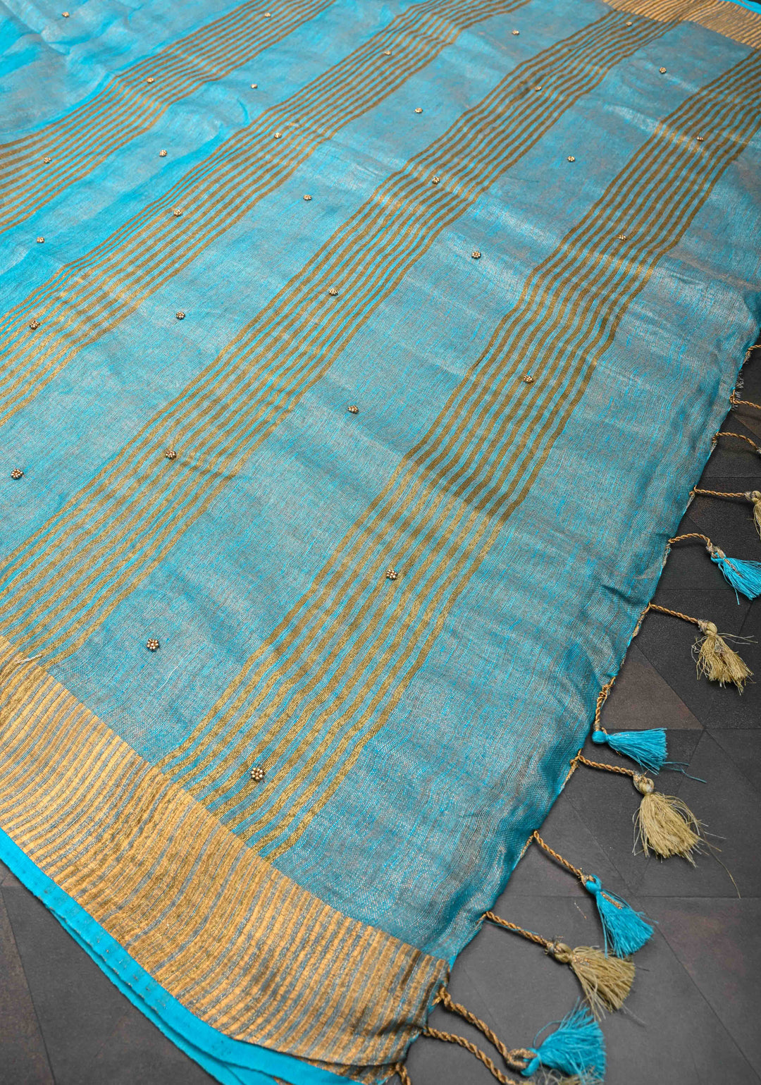 Bluish Cyan Tissue Linen Saree With Hand Beadwork with Golden Tissue
