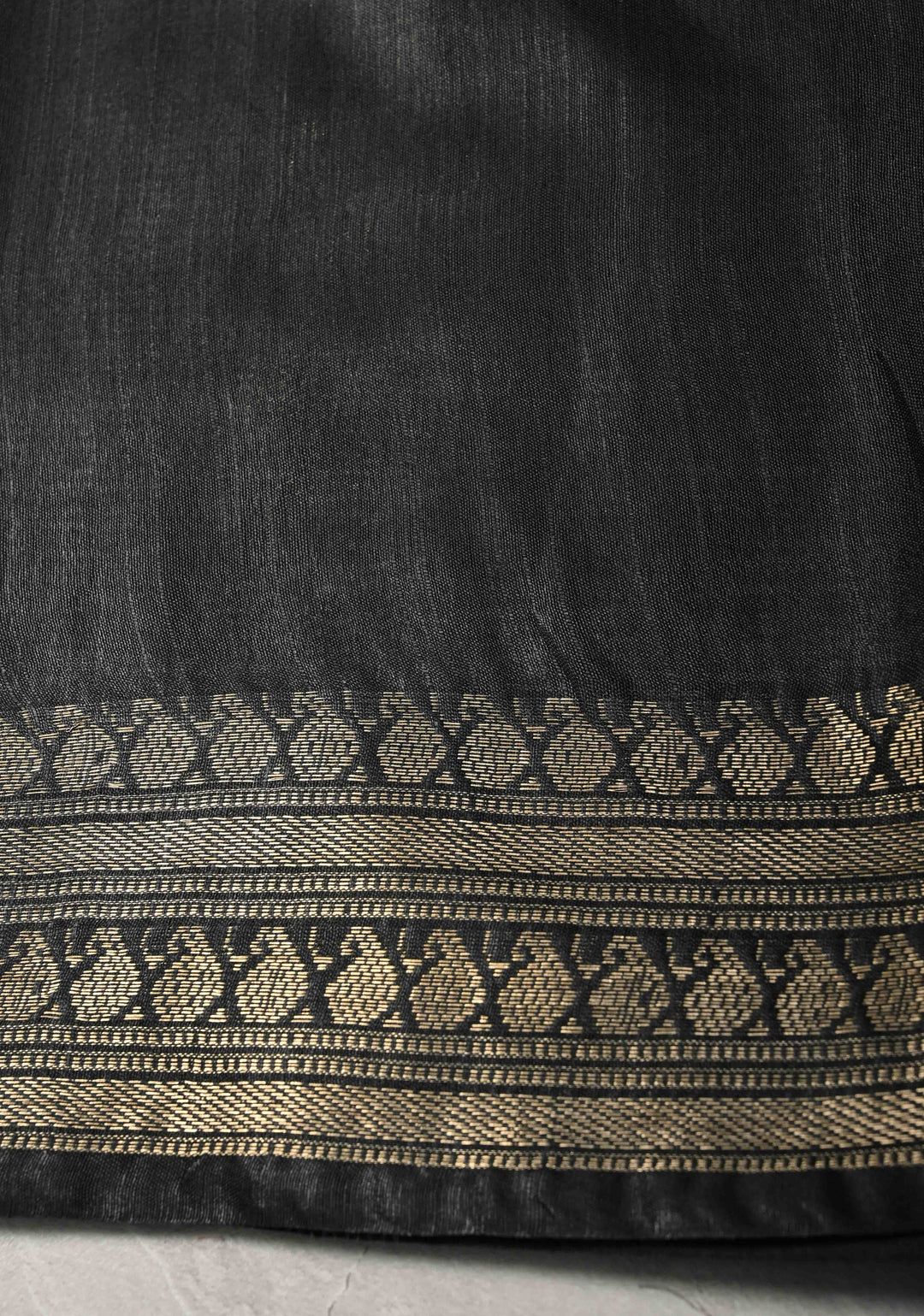 Black Semi Tussar Tissue Silk Saree with Polka Zari Buttis and Zari Border