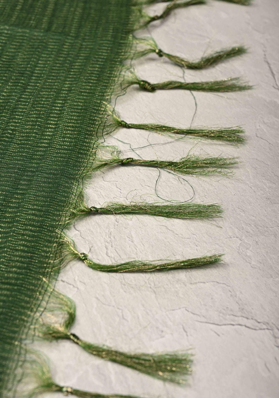 Forest Green Semi Tussar Tissue Silk Saree with Zari Border