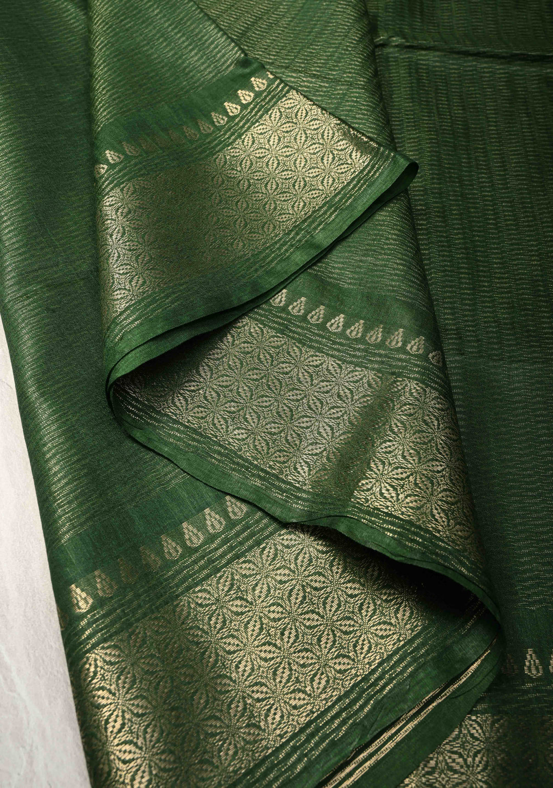Forest Green Semi Tussar Tissue Silk Saree with Zari Border