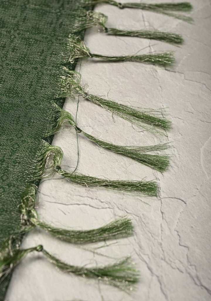 Dark Green Semi Tussar Tissue Silk Saree with Zari Border