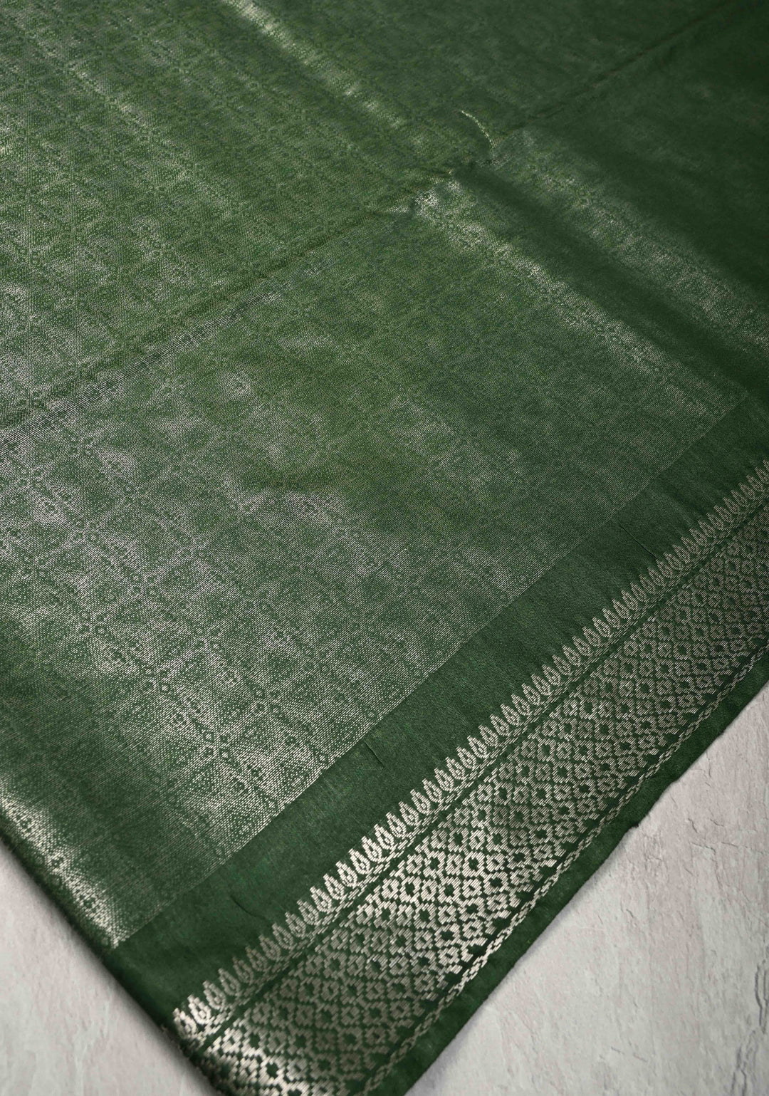 Dark Green Semi Tussar Tissue Silk Saree with Zari Border