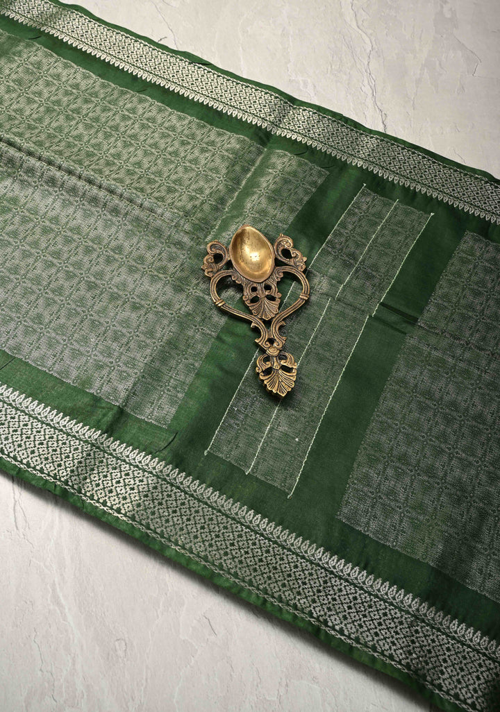 Dark Green Semi Tussar Tissue Silk Saree with Zari Border