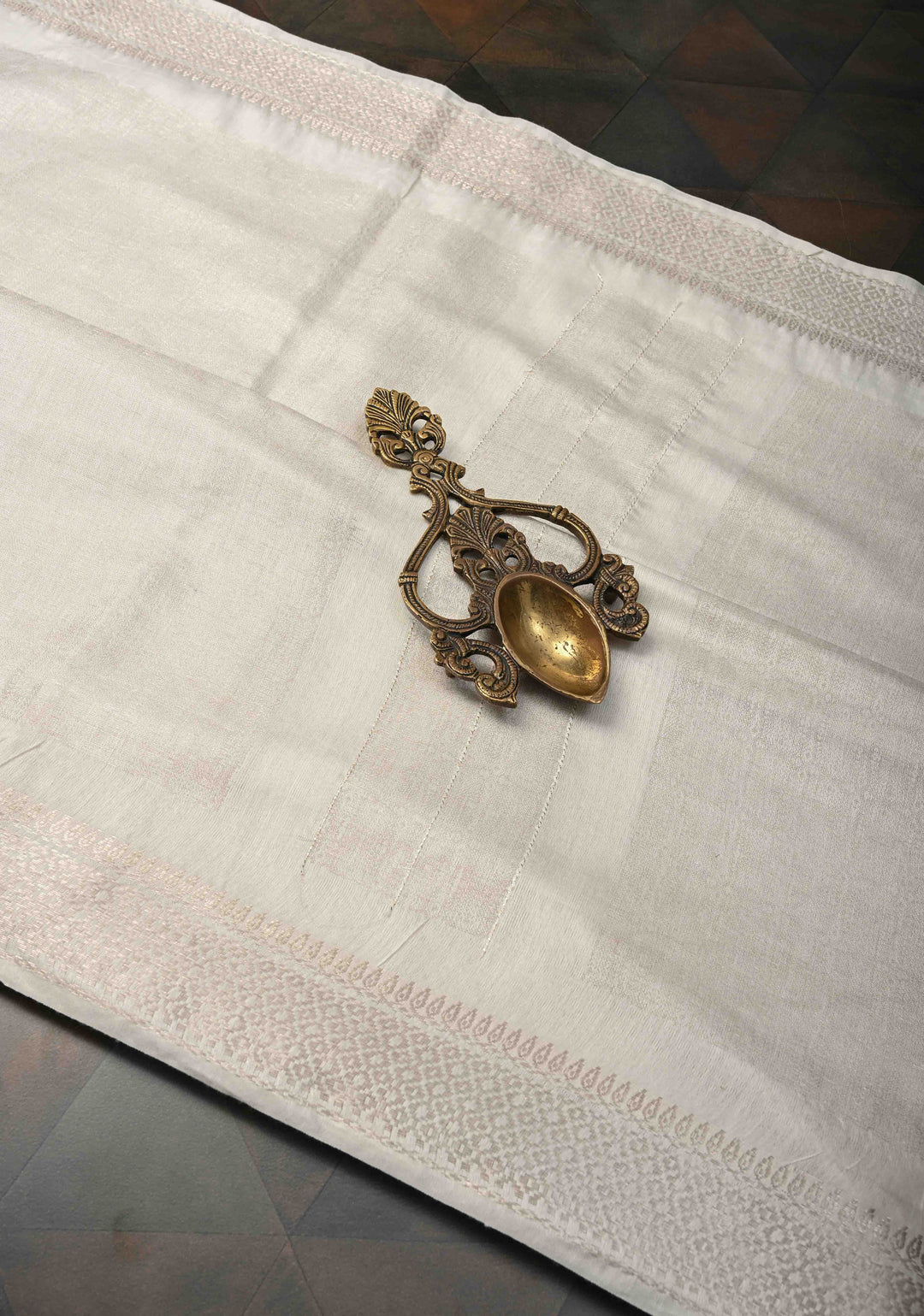 White Semi Tussar Tissue Silk Saree with Zari Border
