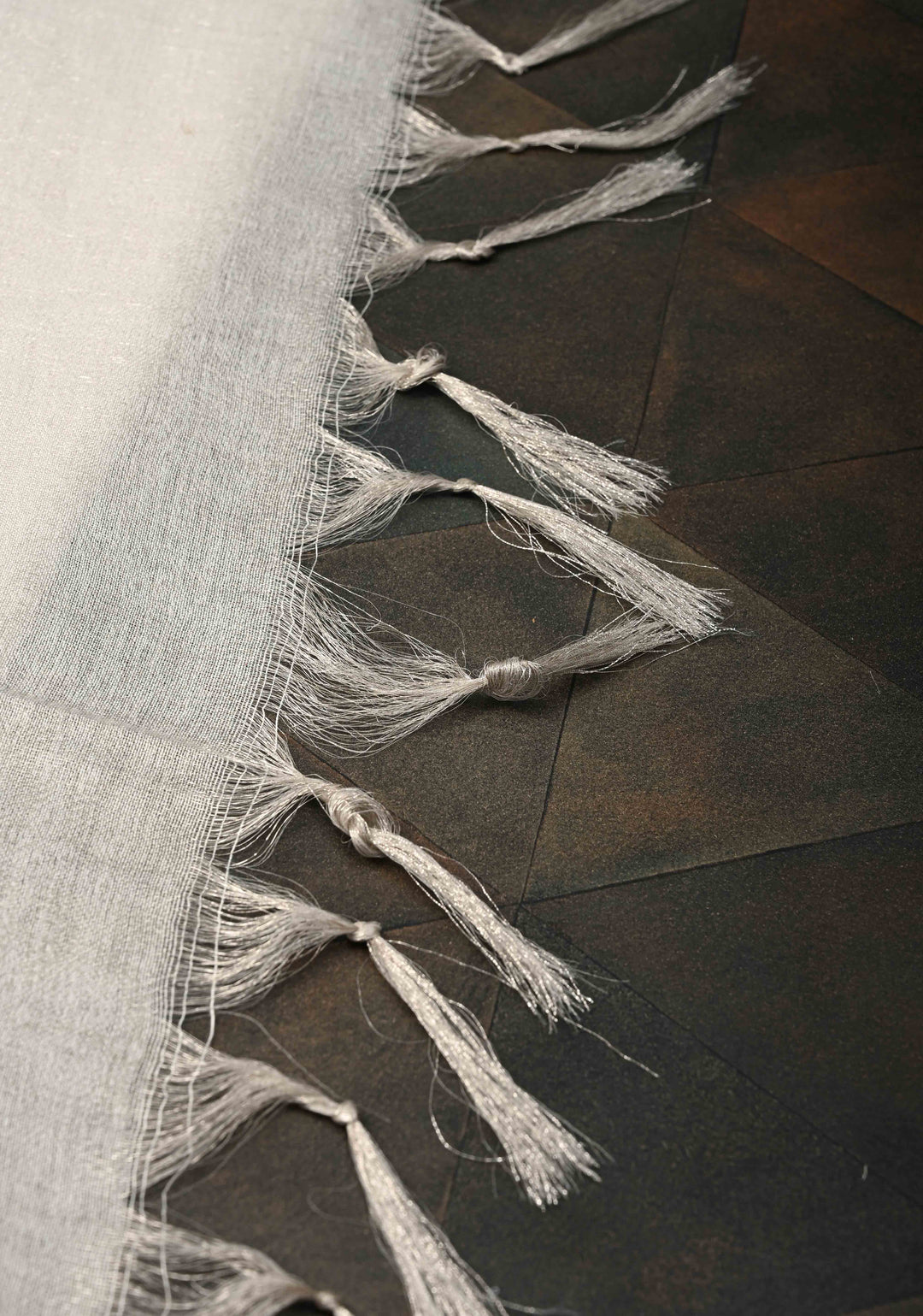 White Semi Tussar Tissue Silk Saree with Zari Border