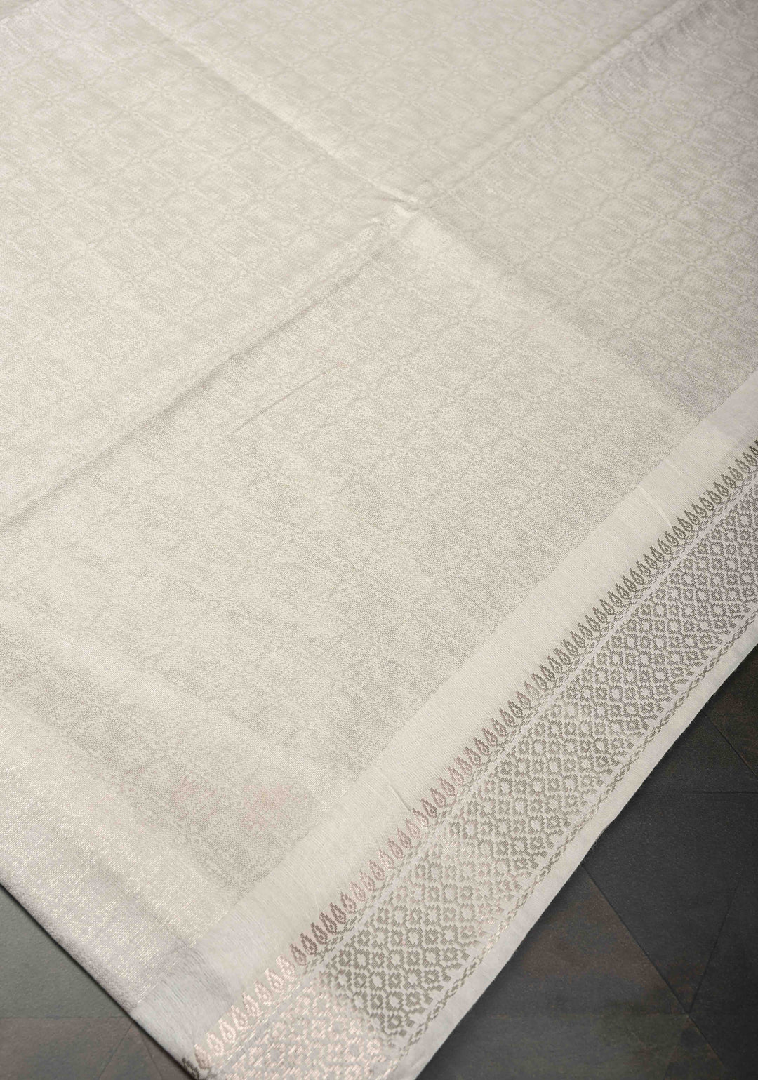 White Semi Tussar Tissue Silk Saree with Zari Border