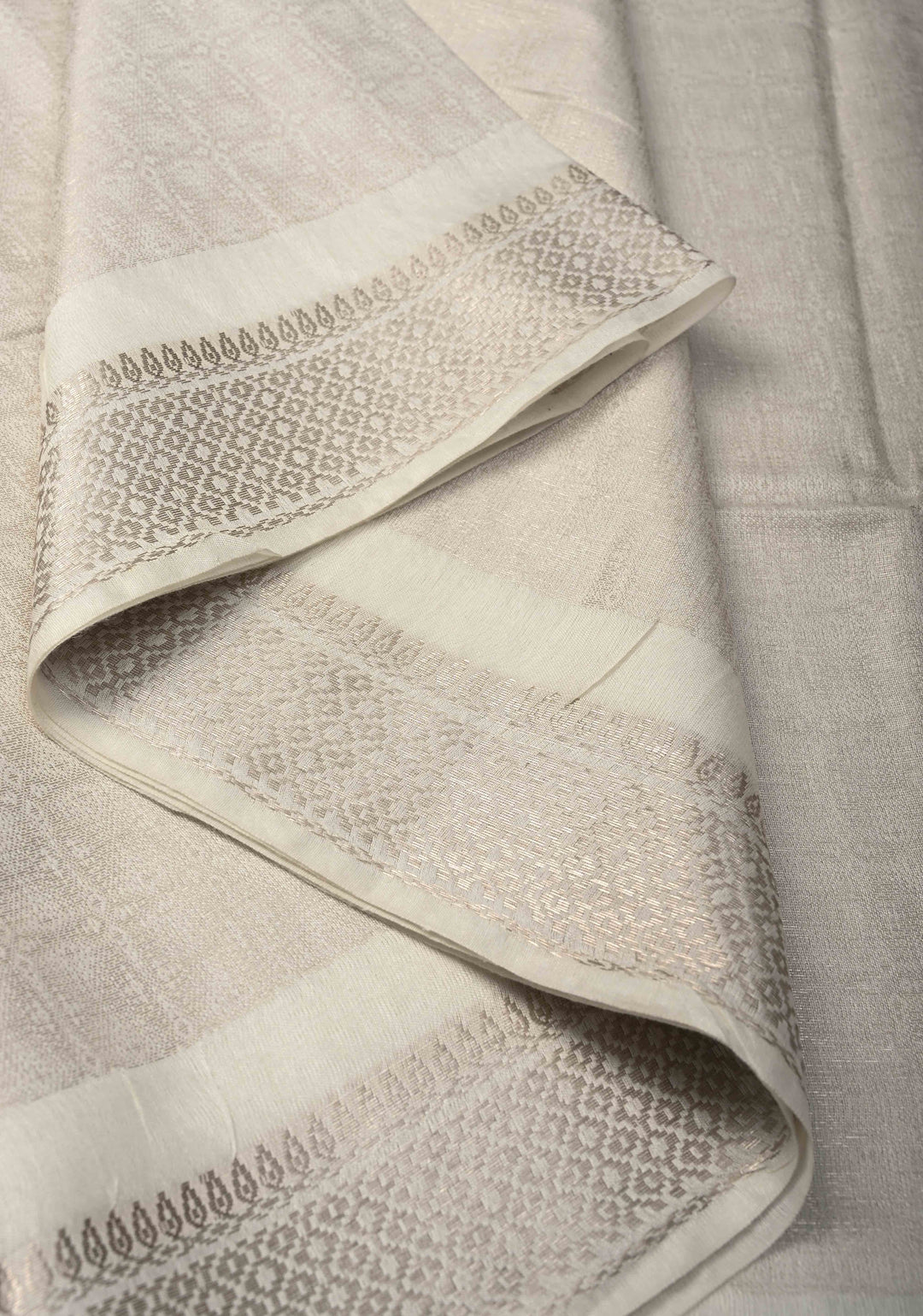 White Semi Tussar Tissue Silk Saree with Zari Border
