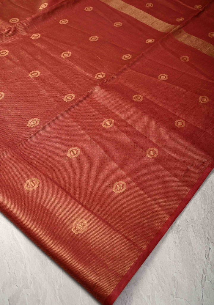 Brick Red Borderless Semi Tussar Tissue Silk Saree with Resham Buttas