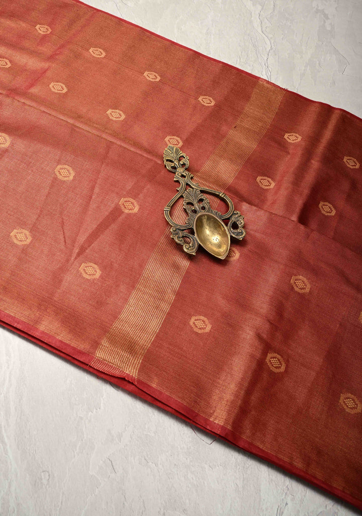 Brick Red Borderless Semi Tussar Tissue Silk Saree with Resham Buttas