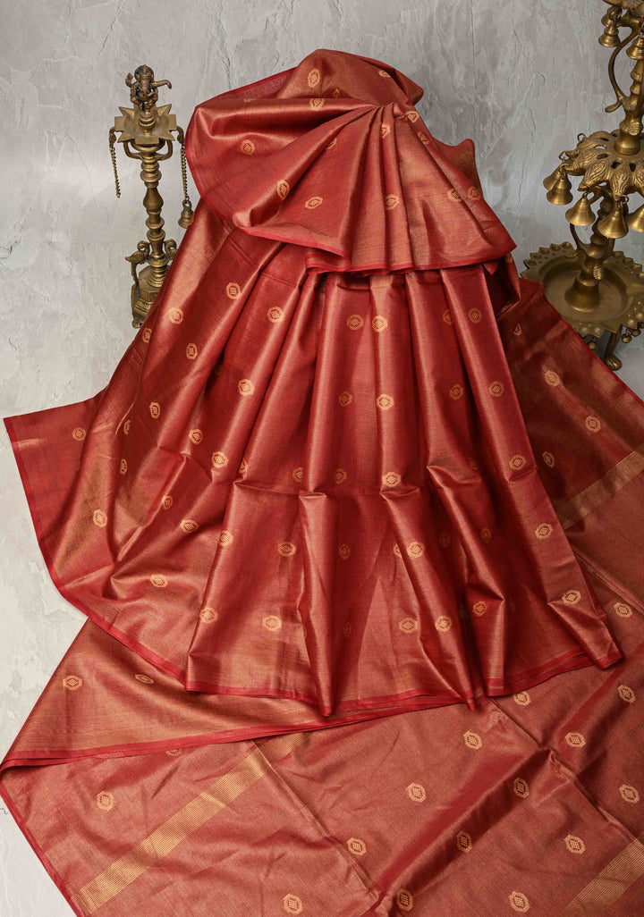 Brick Red Borderless Semi Tussar Tissue Silk Saree with Resham Buttas