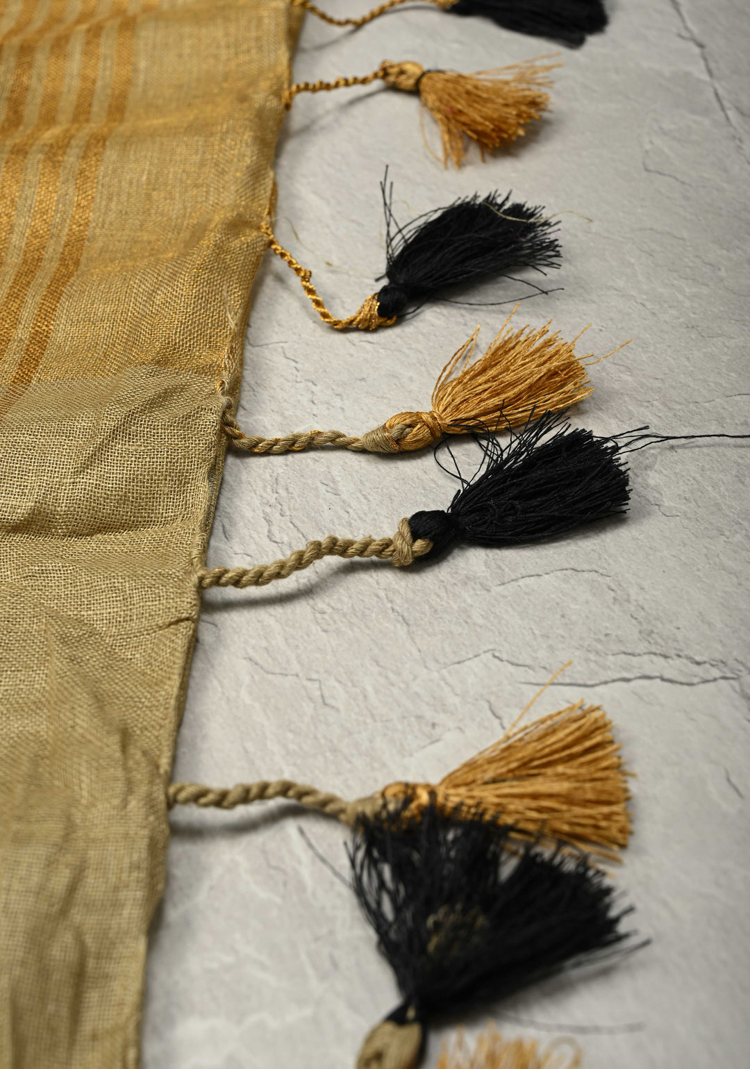 Patina Gray Tissue Body Linen Saree in Muted Antique Gold with Sona Rupa Polka Dots Skirt Border