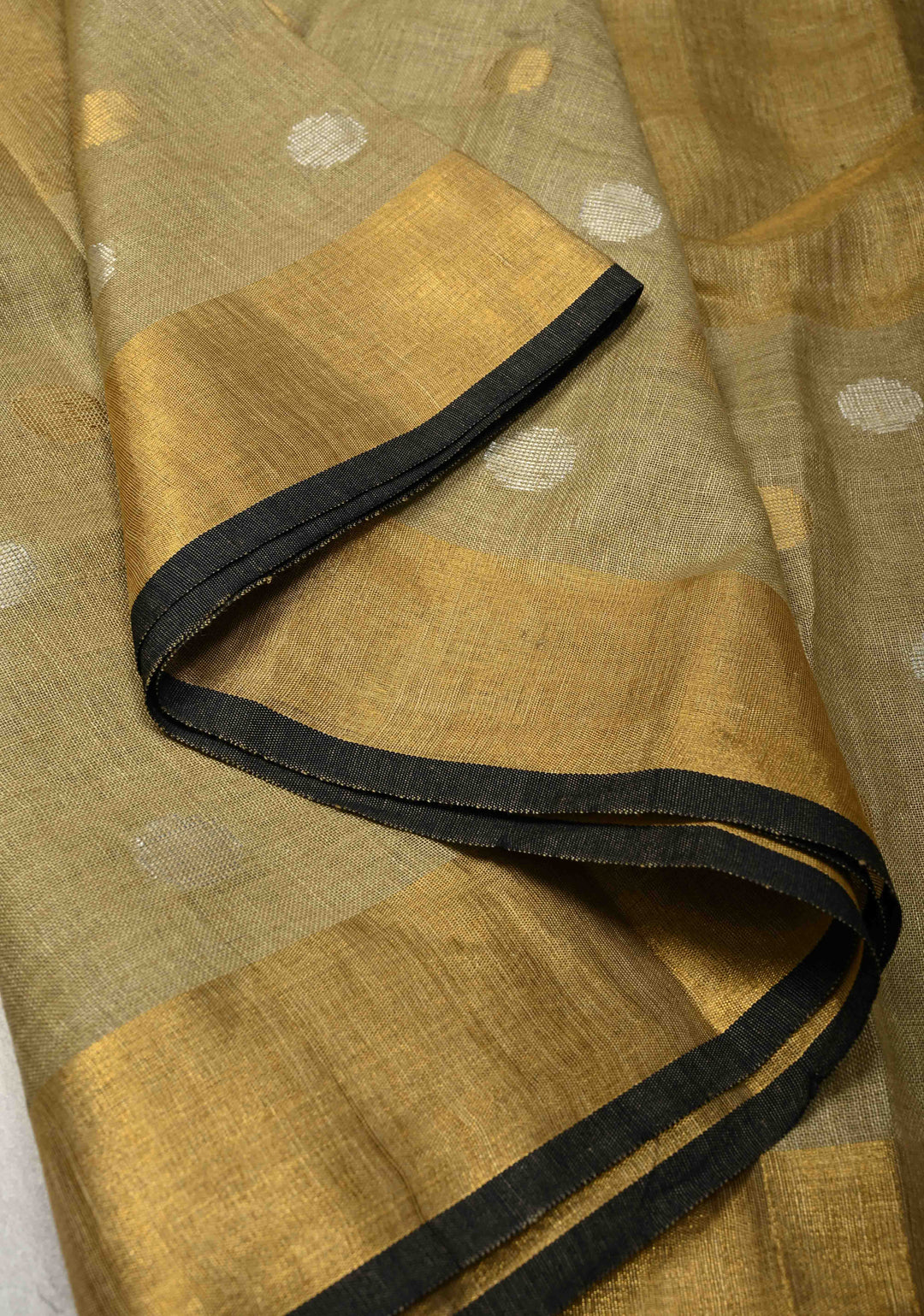 Patina Gray Tissue Body Linen Saree in Muted Antique Gold with Sona Rupa Polka Dots Skirt Border