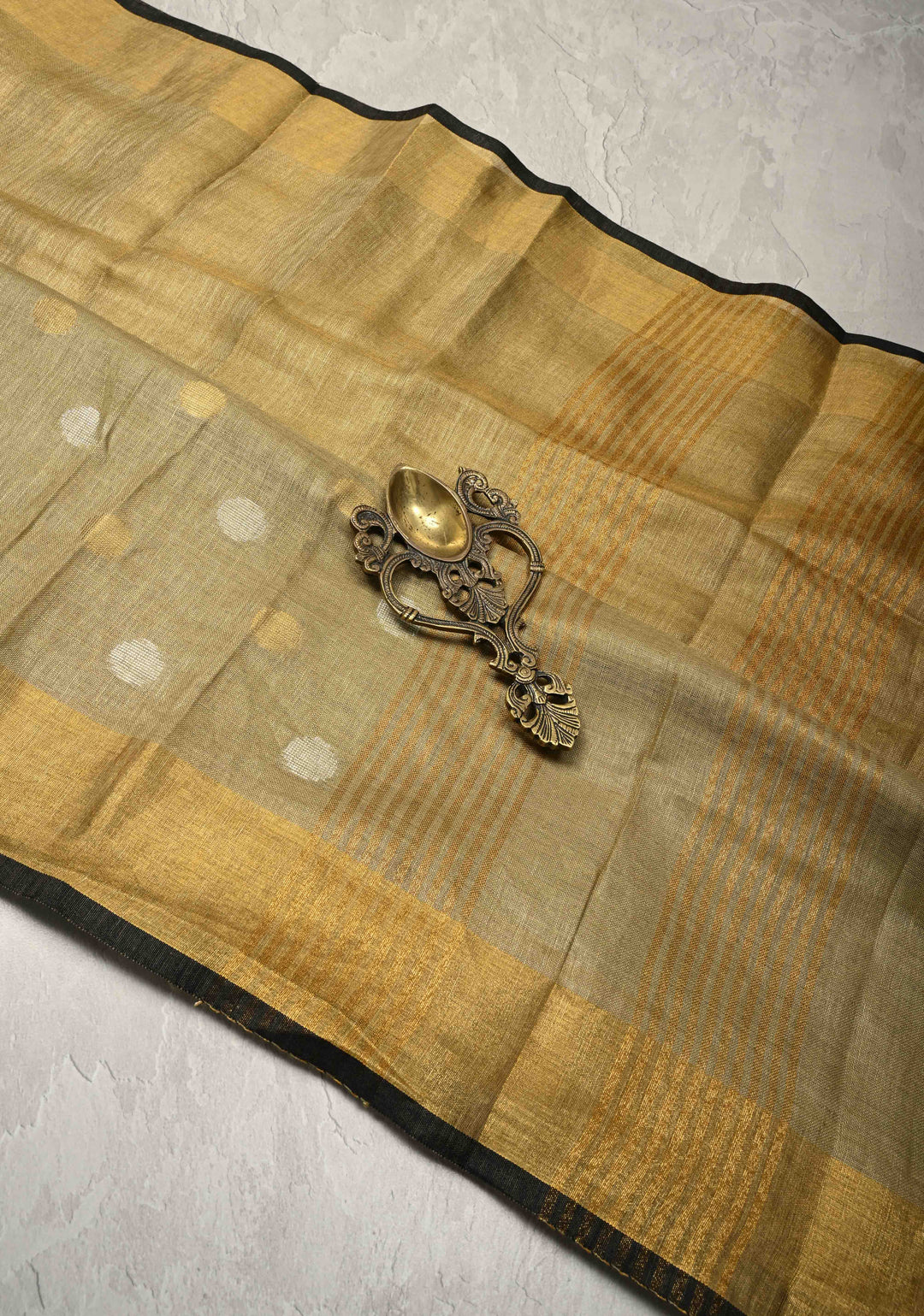 Patina Gray Tissue Body Linen Saree in Muted Antique Gold with Sona Rupa Polka Dots Skirt Border